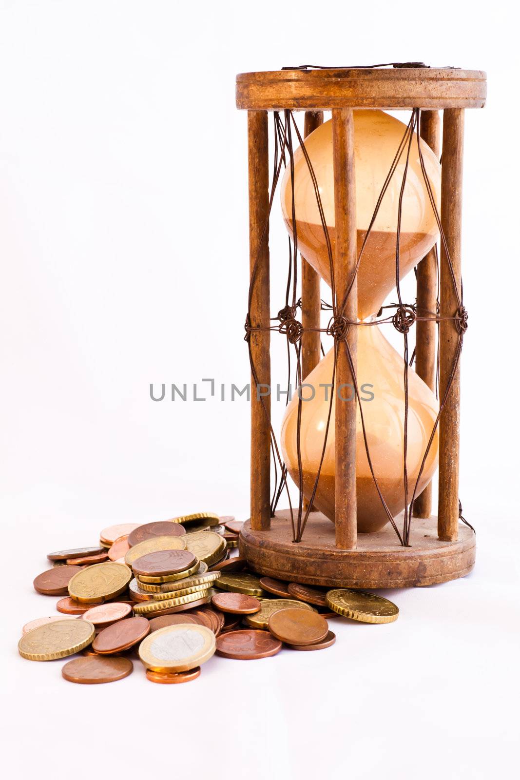 Old hourglass (made in India, XIX century) with euros