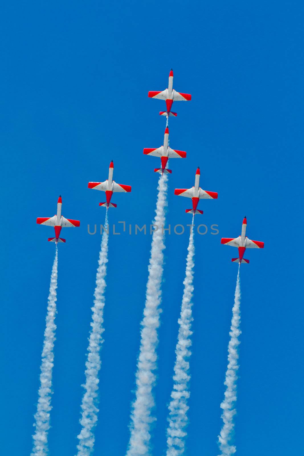 CADIZ, SPAIN-SEP 9: Aircrafts of the Patrulla Aguila taking part in a test on the 4th airshow of Cadiz on Sep 9, 2011, in Cadiz, Spain