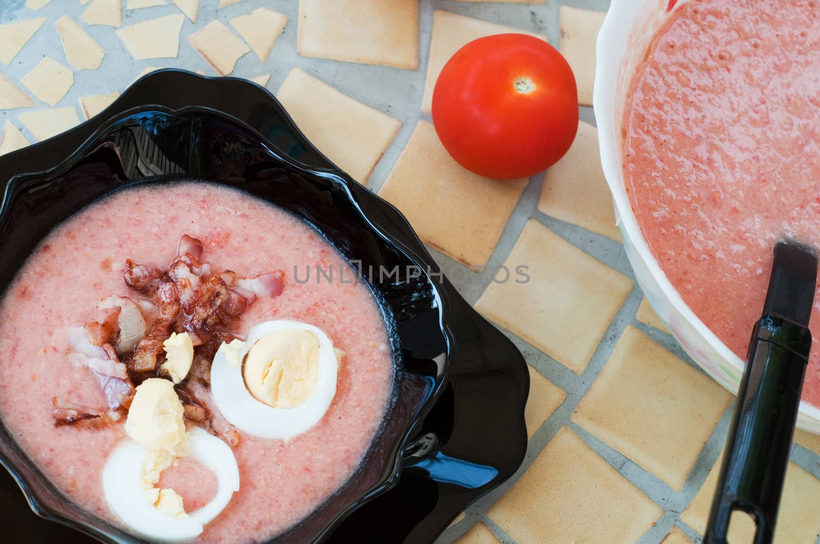 Shot of cold red soup on the table
