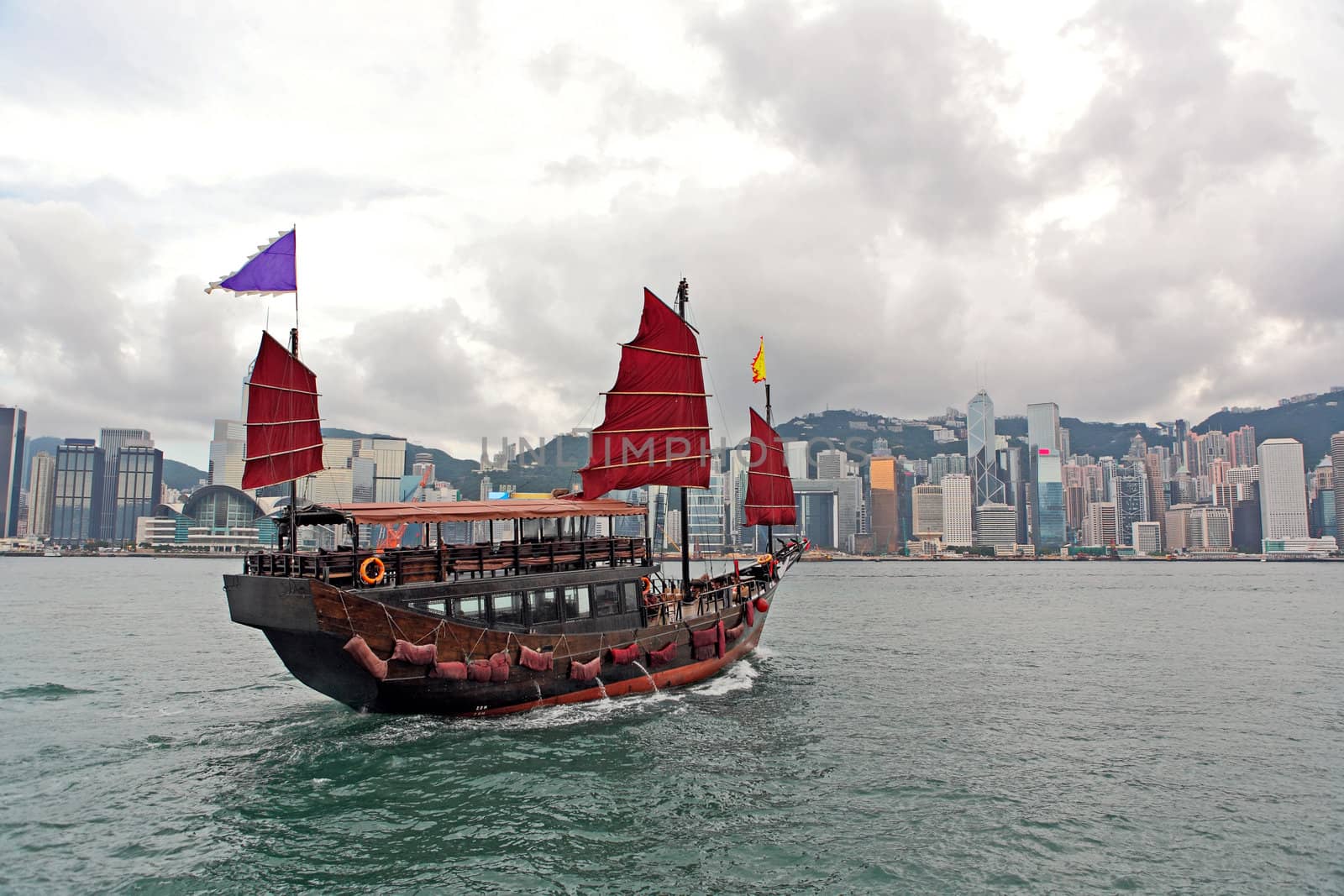 Hong Kong harbour with tourist junk