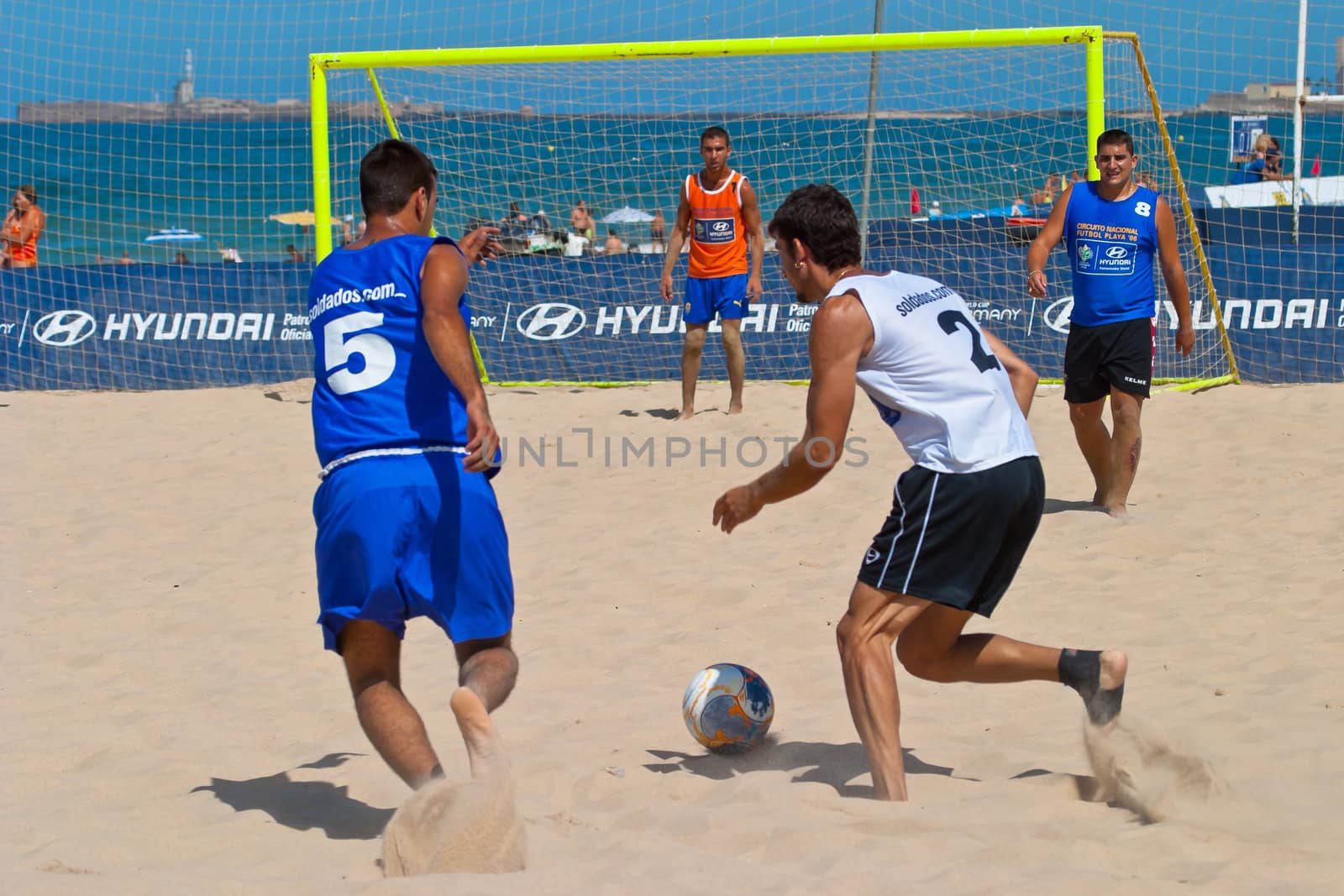 CADIZ, SPAIN -  JUL 22:  Unknown players of unknown team playing the Spanish Championship of Beach Soccer on Jul 22, 2006 on the beach of La Victoria in Cadiz, Spain
