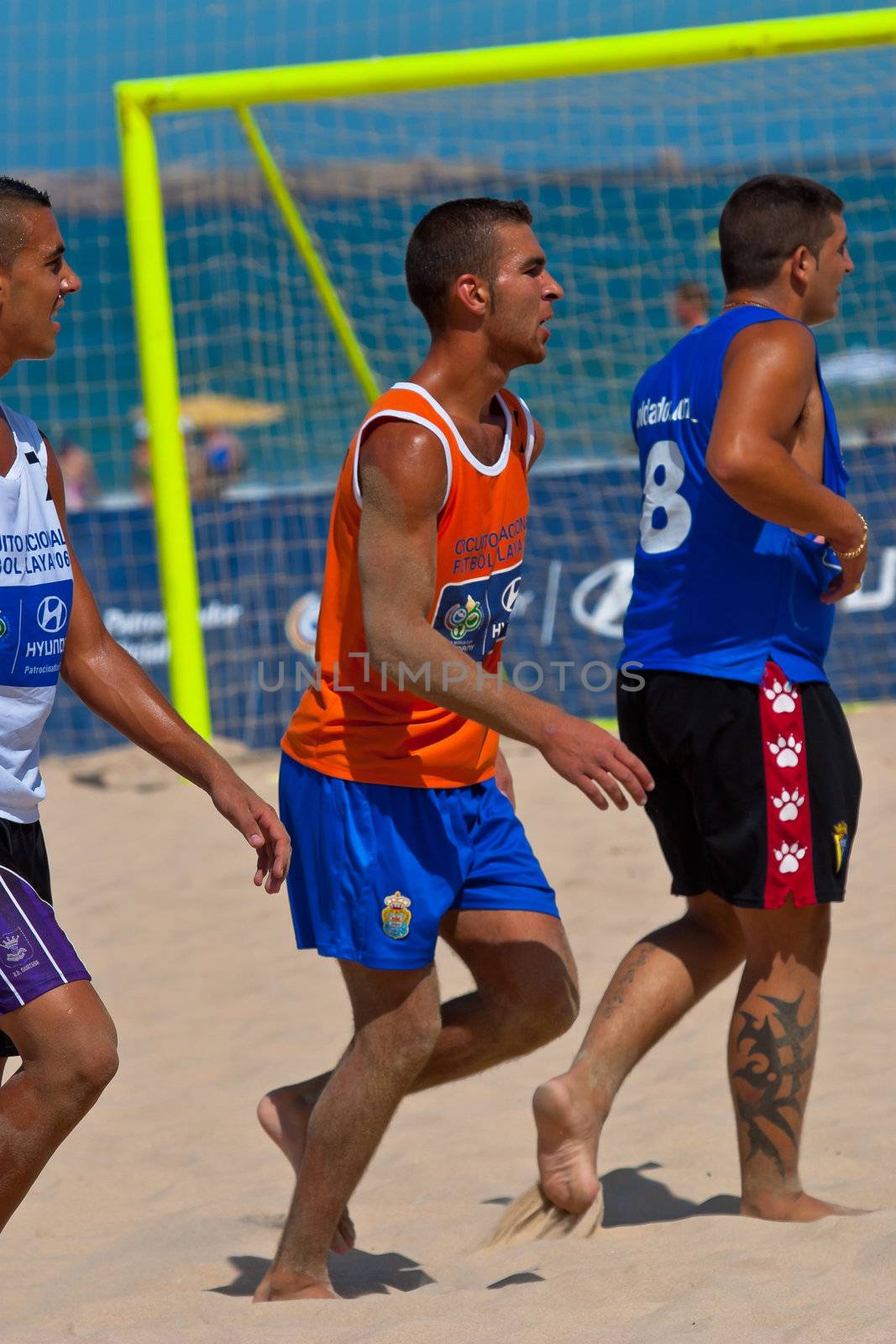 CADIZ, SPAIN -  JUL 22:  Unknown players of unknown team playing the Spanish Championship of Beach Soccer on Jul 22, 2006 on the beach of La Victoria in Cadiz, Spain