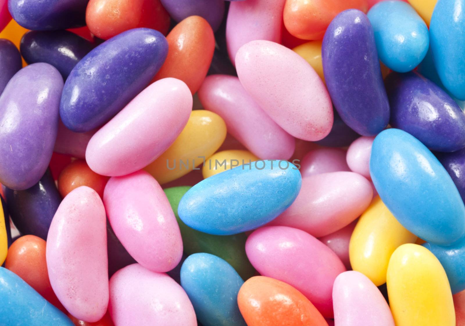 Jelly beans in many different colors - close up by tish1