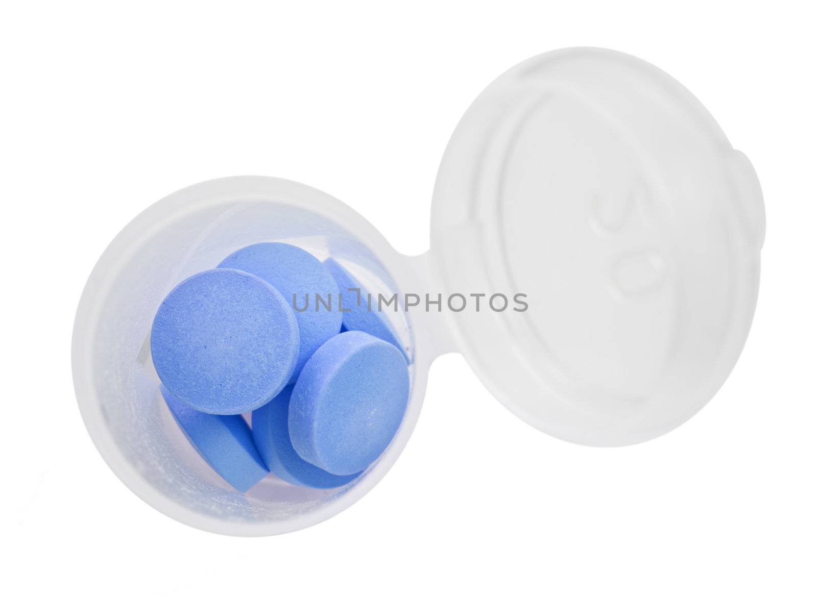 Blue pills and pill bottle on white  background with space for text