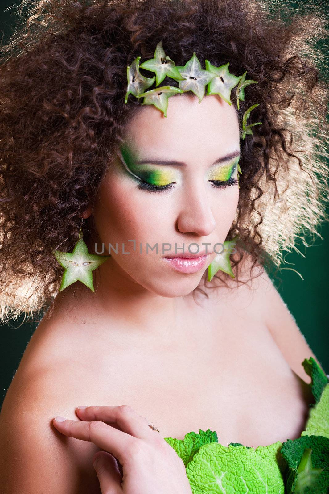 beautiful pregnant young woman dressed in cabbage