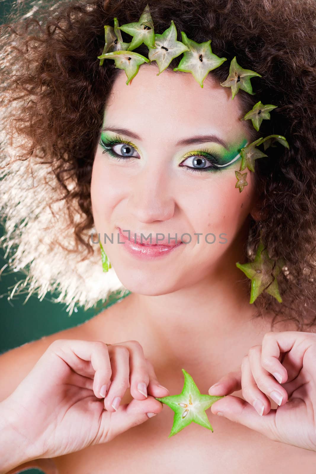 beautiful pregnant young woman dressed in cabbage