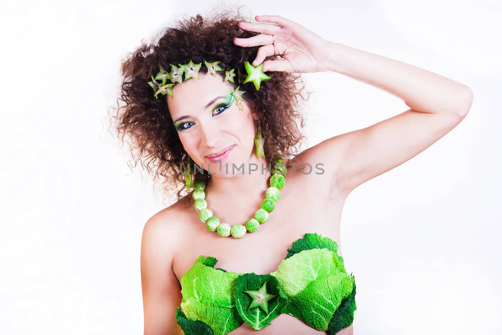 beautiful pregnant young woman dressed in cabbage