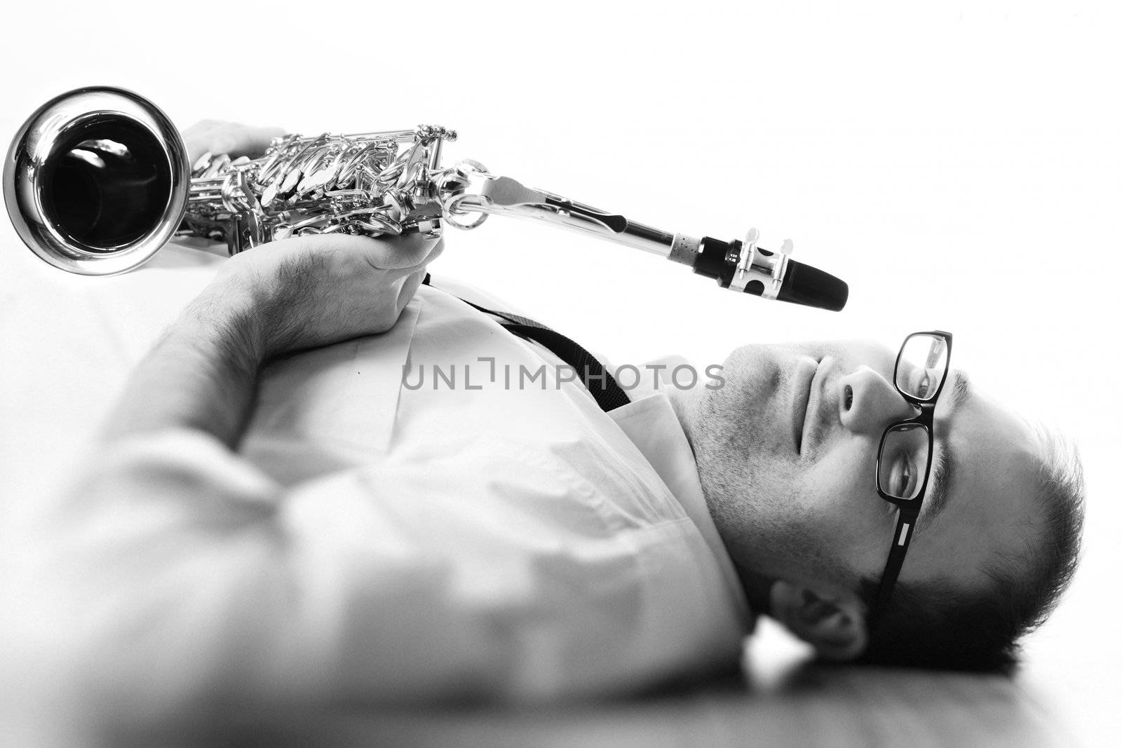 portrait of a man with a saxophone