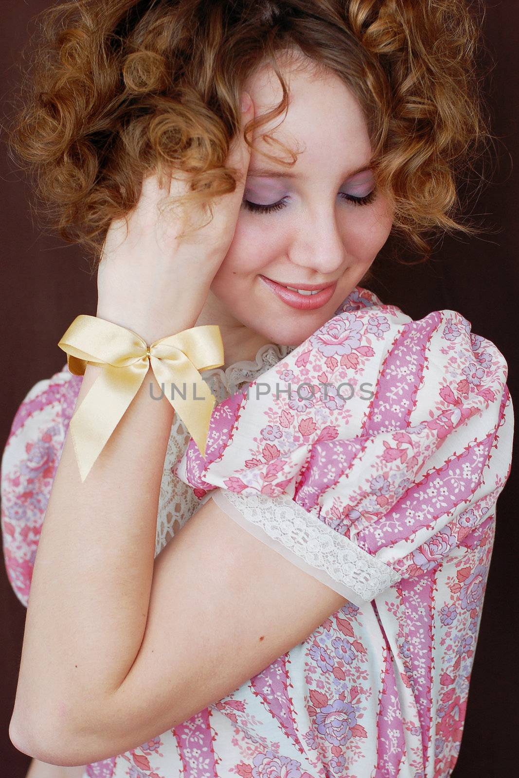 portrait of beautiful girl in colored dress