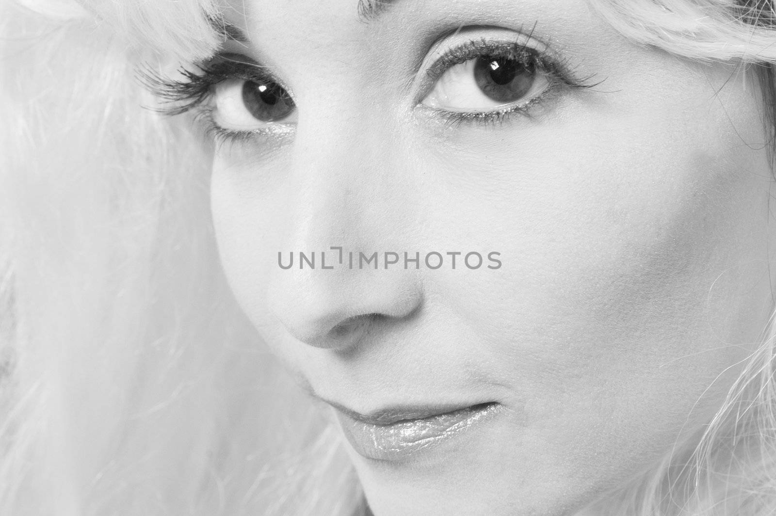 Portrait of a woman in front of a white background in a studio enviroment