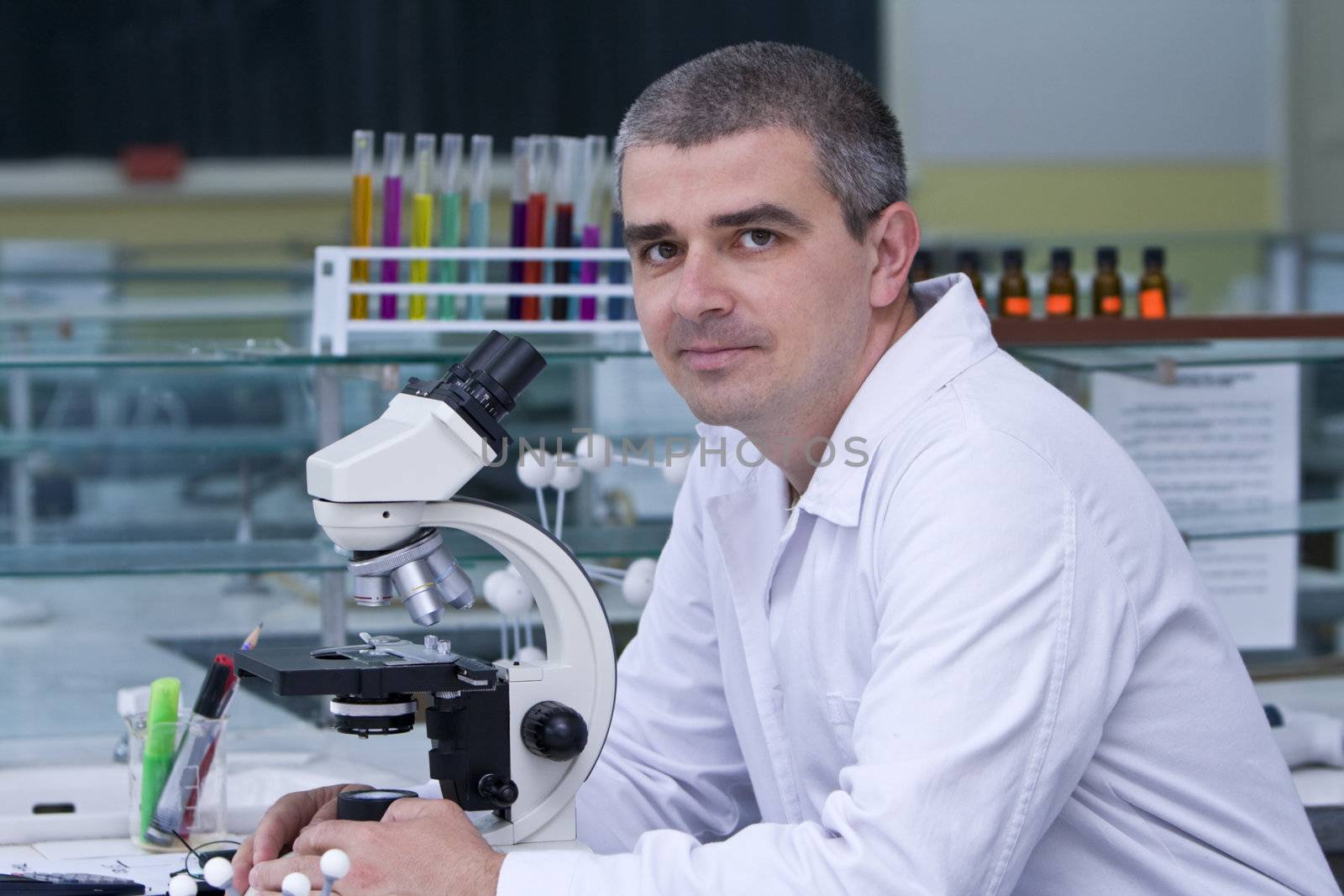Portrait of a researcher at his workplace.