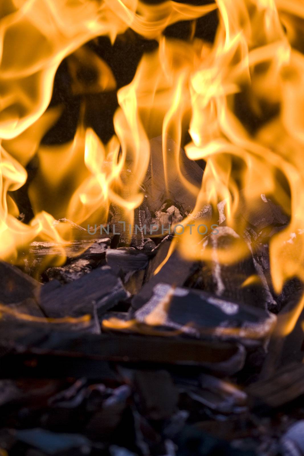 Fire in charcoal briquette barbeque grill.