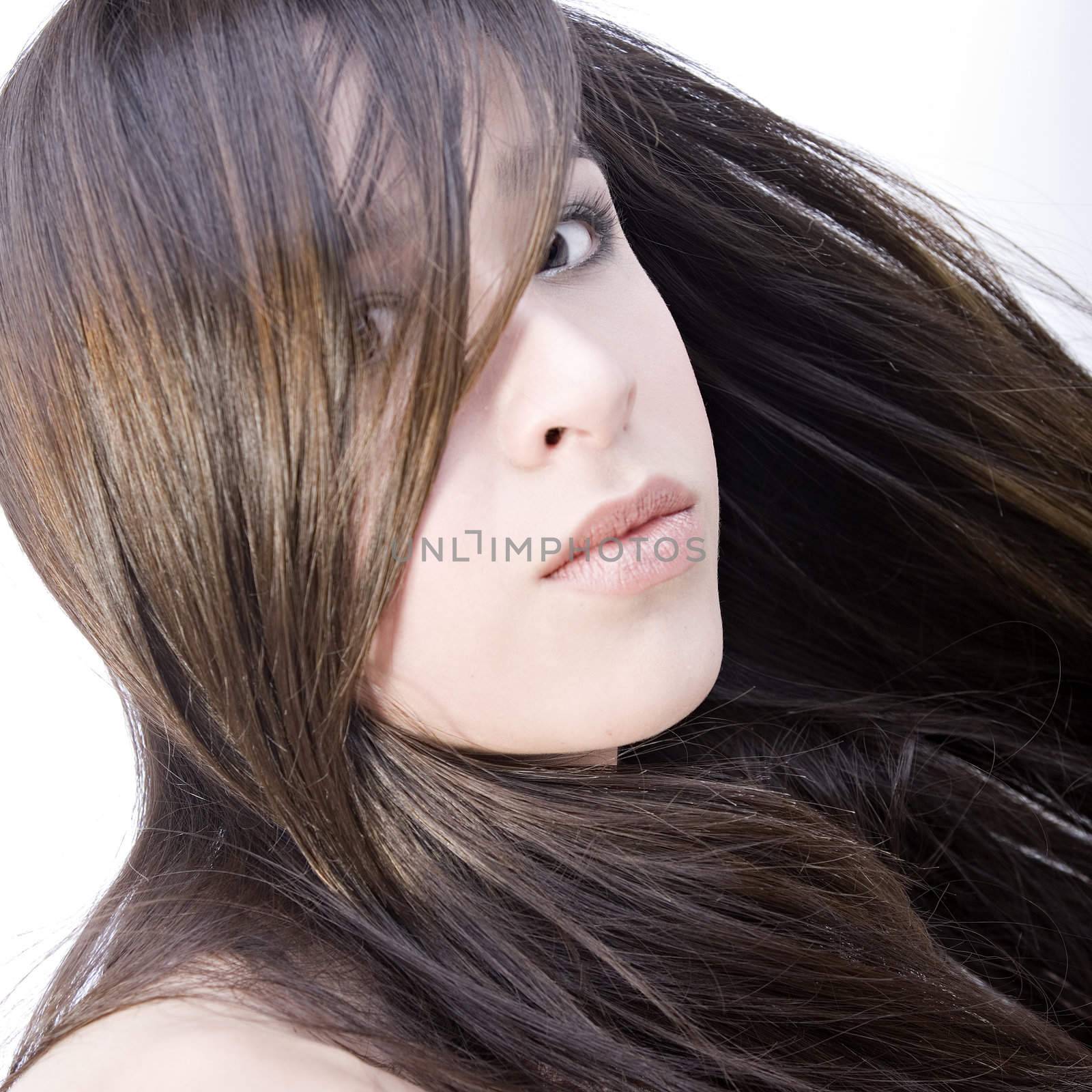 Studio portrait of a beautiful mixed race, vietnamese girl looking seductive