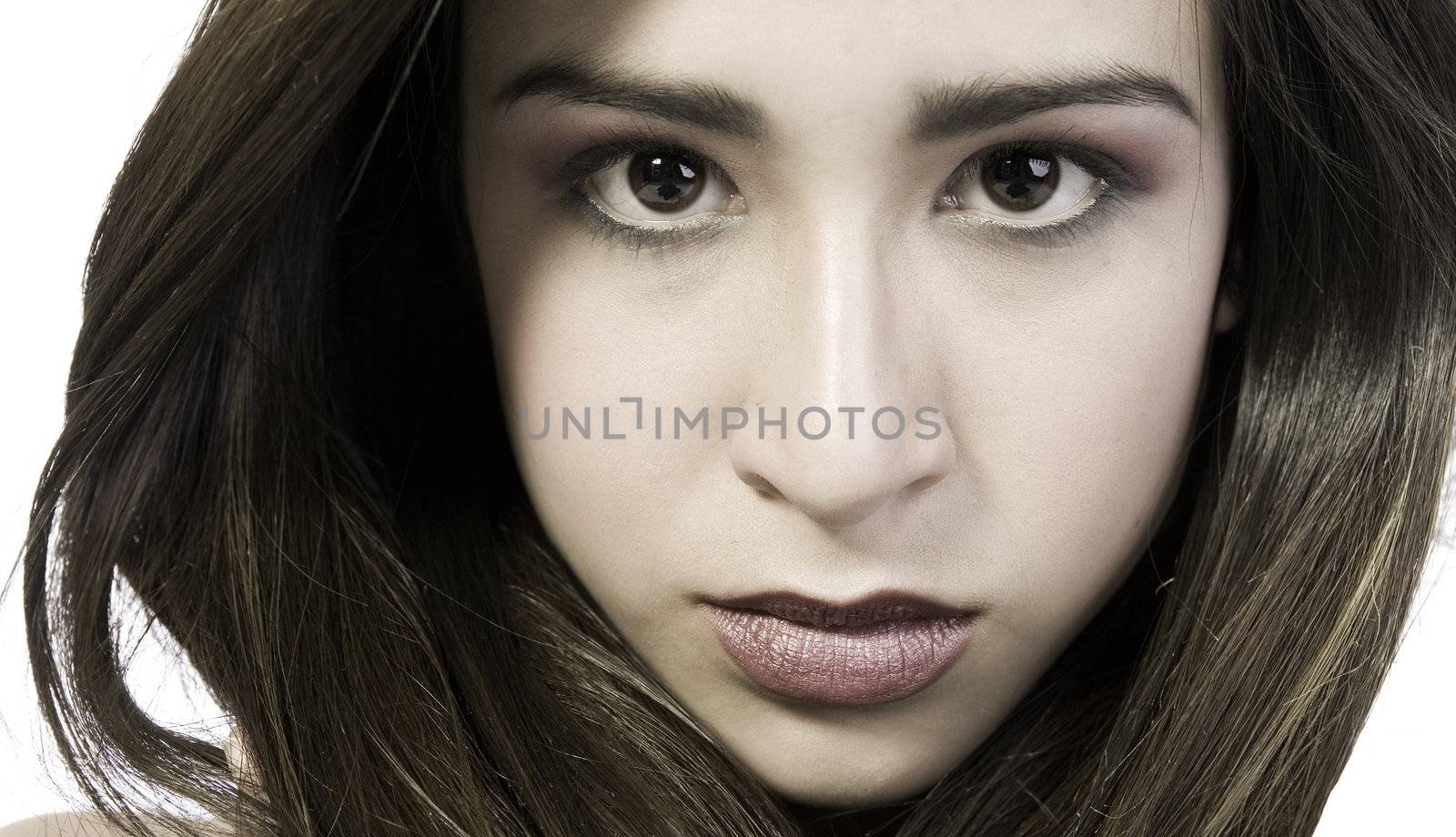 Studio portrait of a beautiful mixed race, vietnamese girl looking awesome