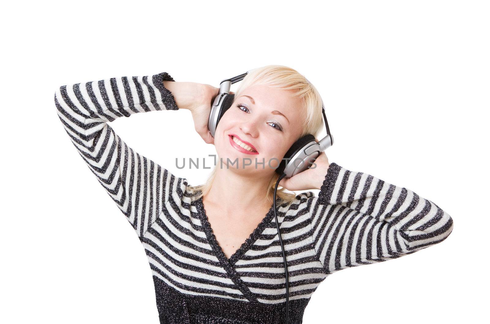 a happy girl in headphones listening music
