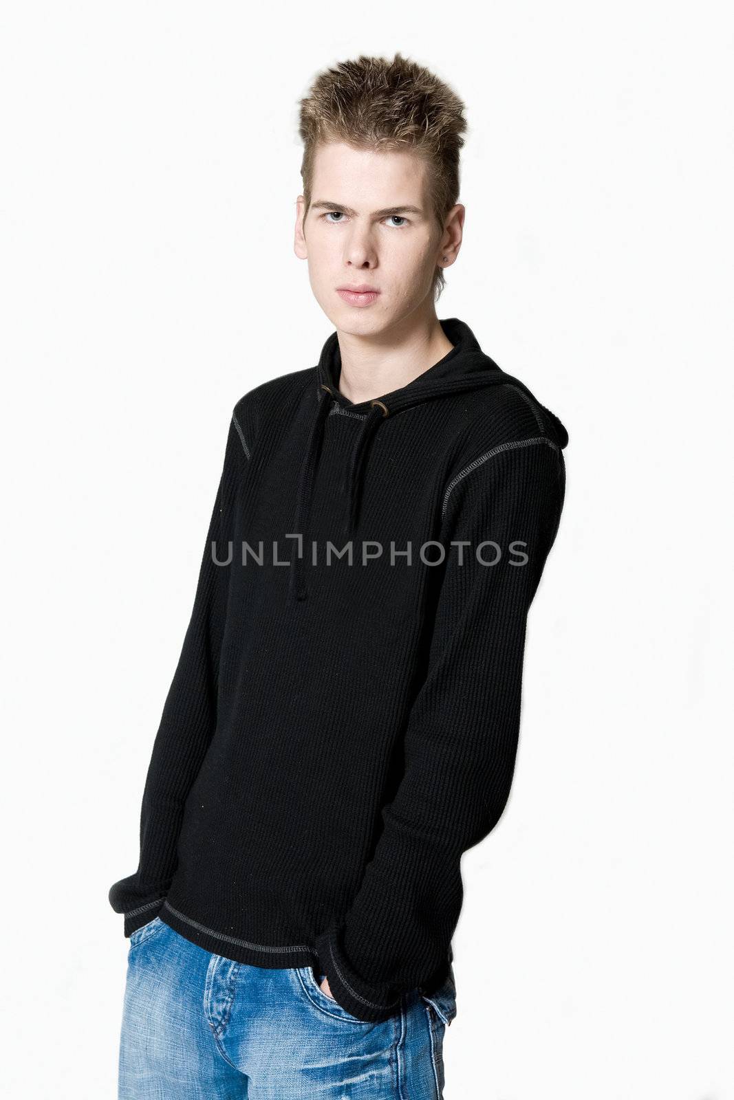 studio portrait of a bored looking young man 
