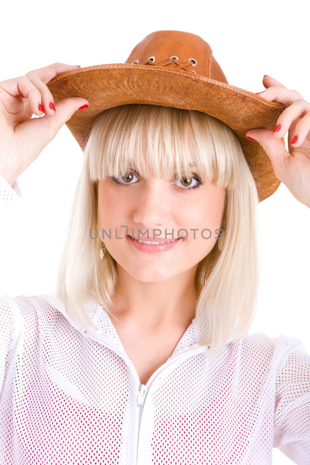blond girl puts on a cowboy hat