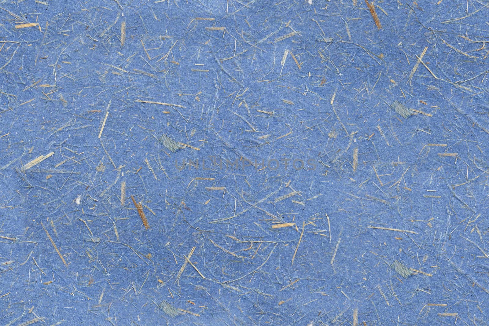 Blue paper texture with grass fibers.