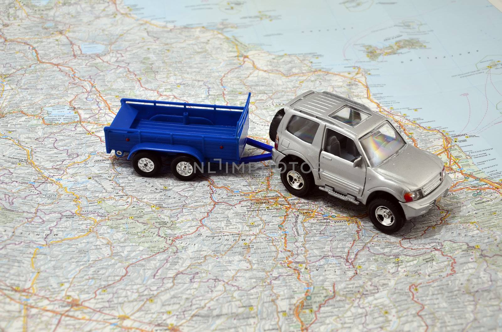 concept small jeep with trailer toy car on italy map