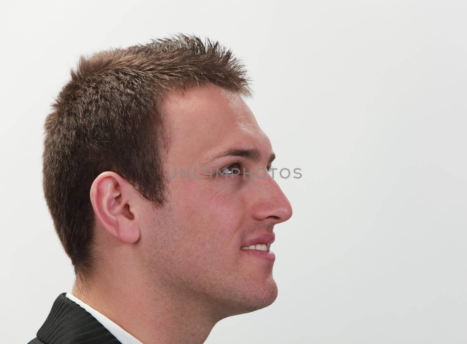 Profile of a young successful businessman.
