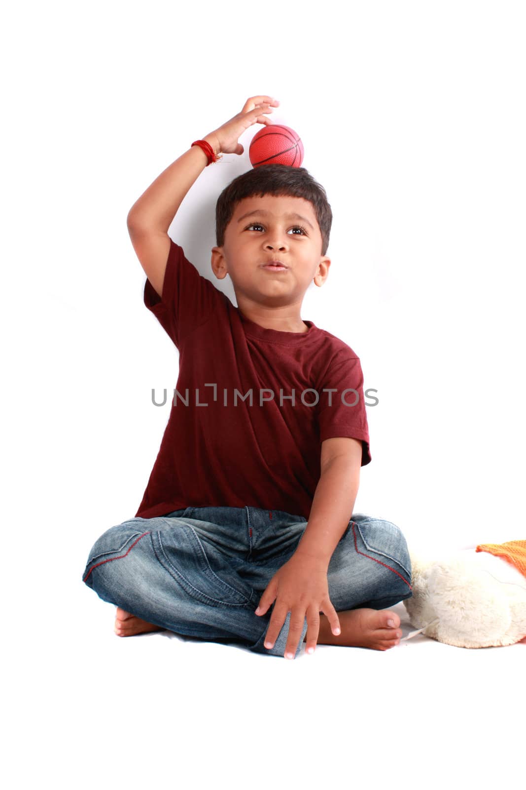 A cute Indian boy in a playful mood.