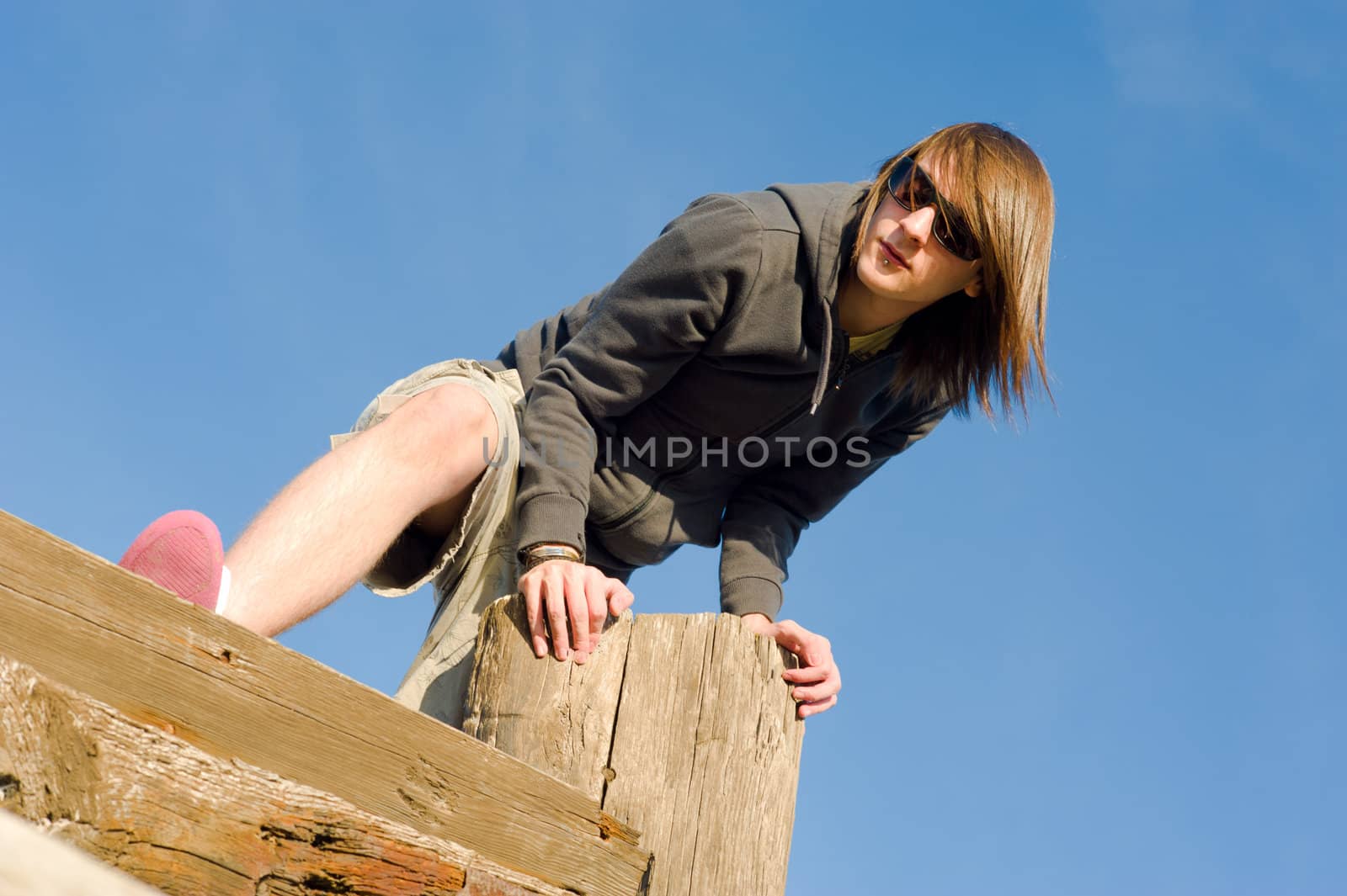 Guy standing on a vessel prow, a concept