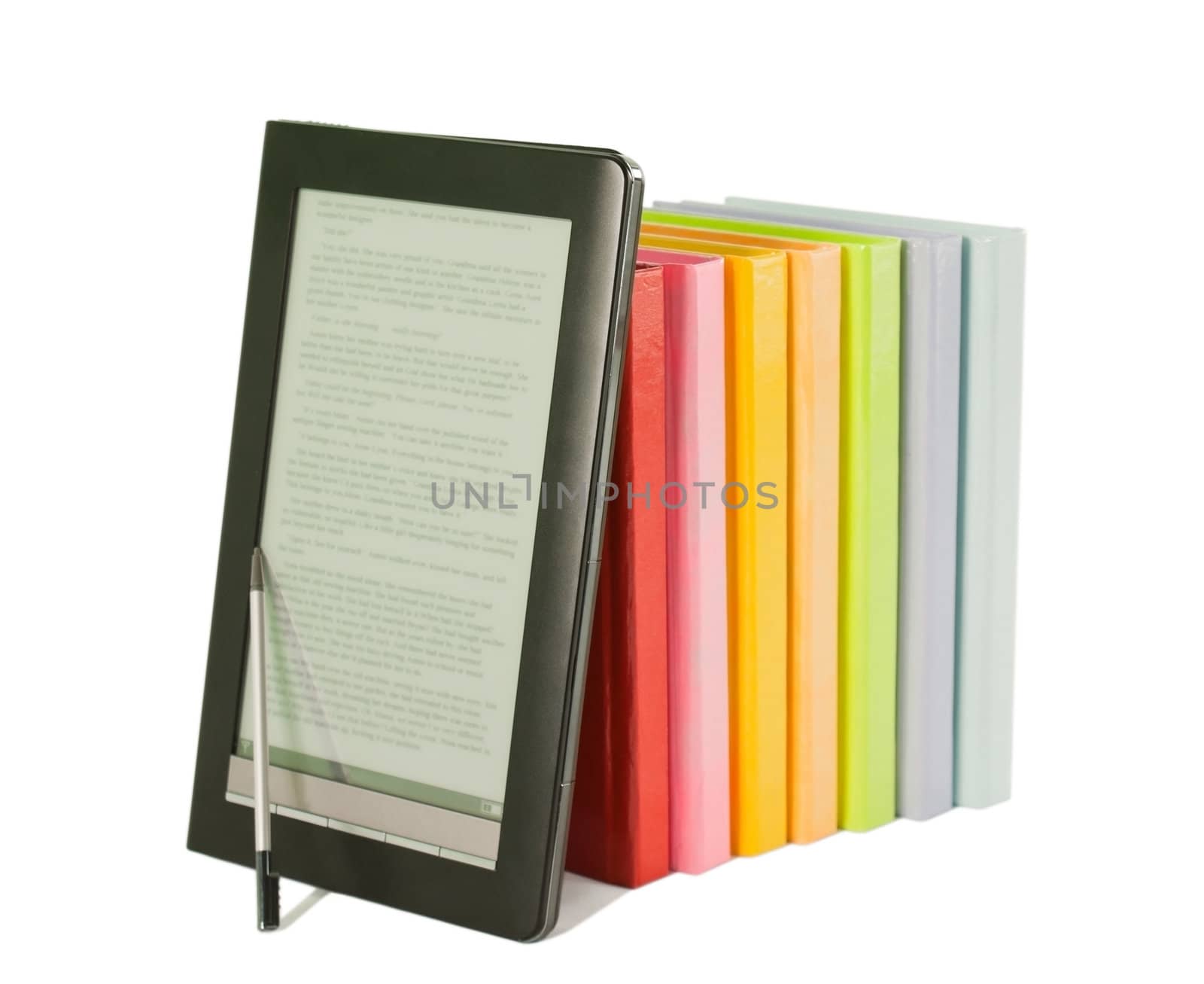 Row of colorful books and electronic book reader on the white background