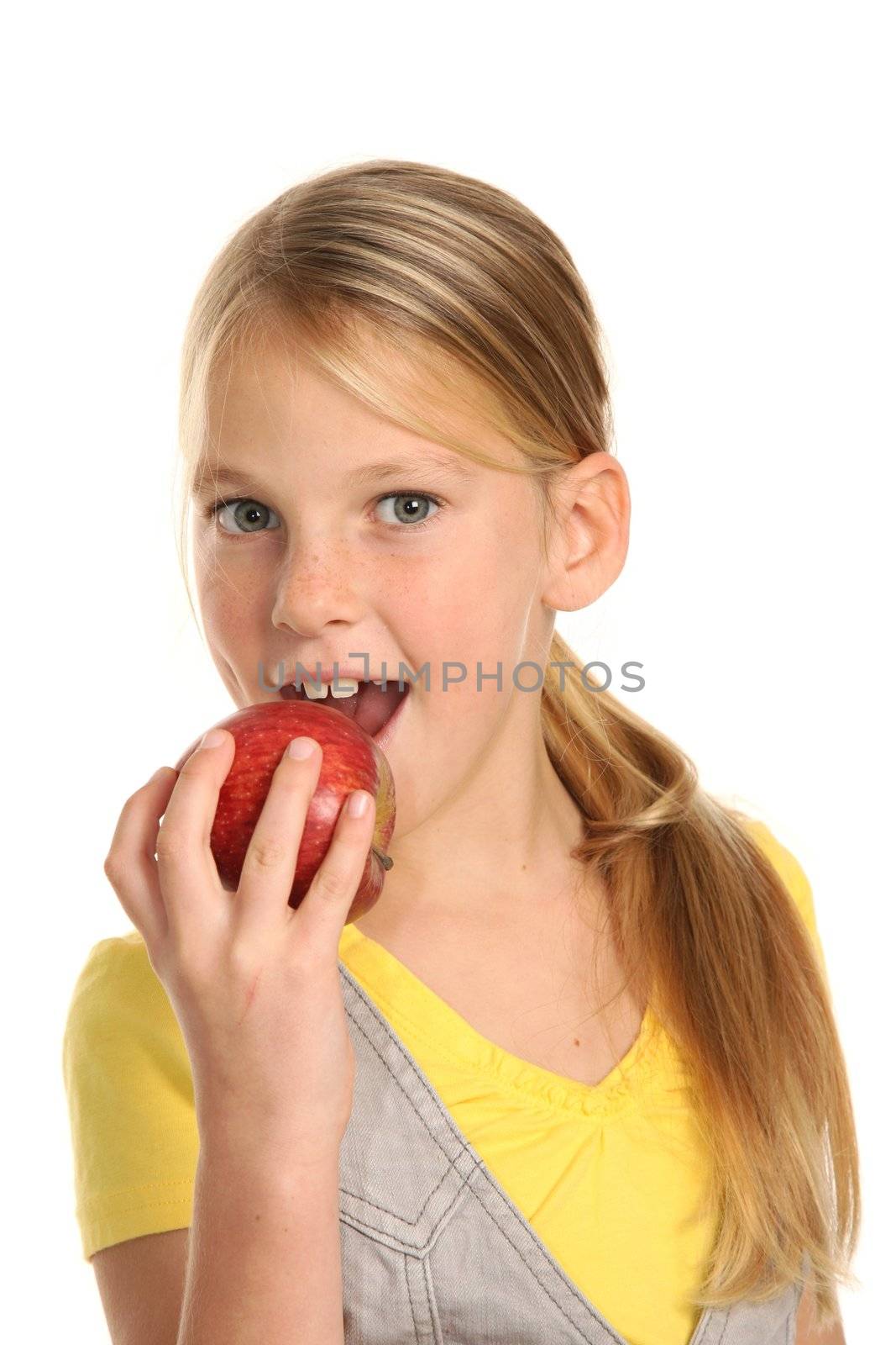 Young School Girl with Juicy Red Apple by fouroaks
