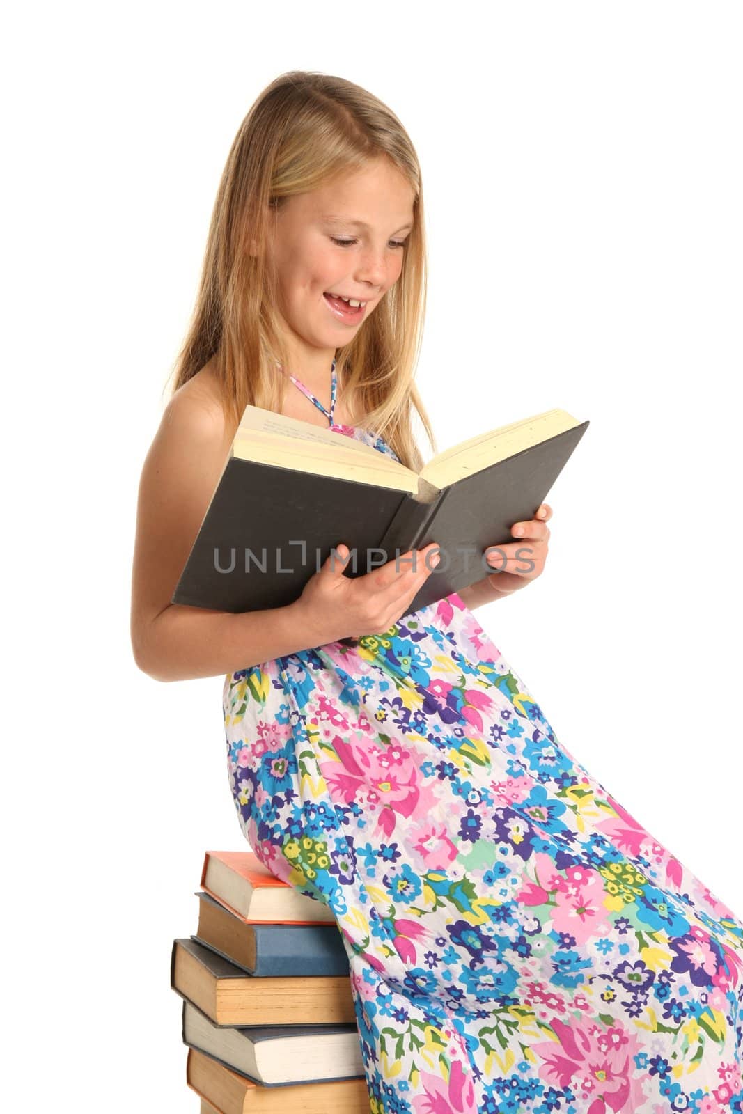 Cute School Girl Sitting on Books by fouroaks