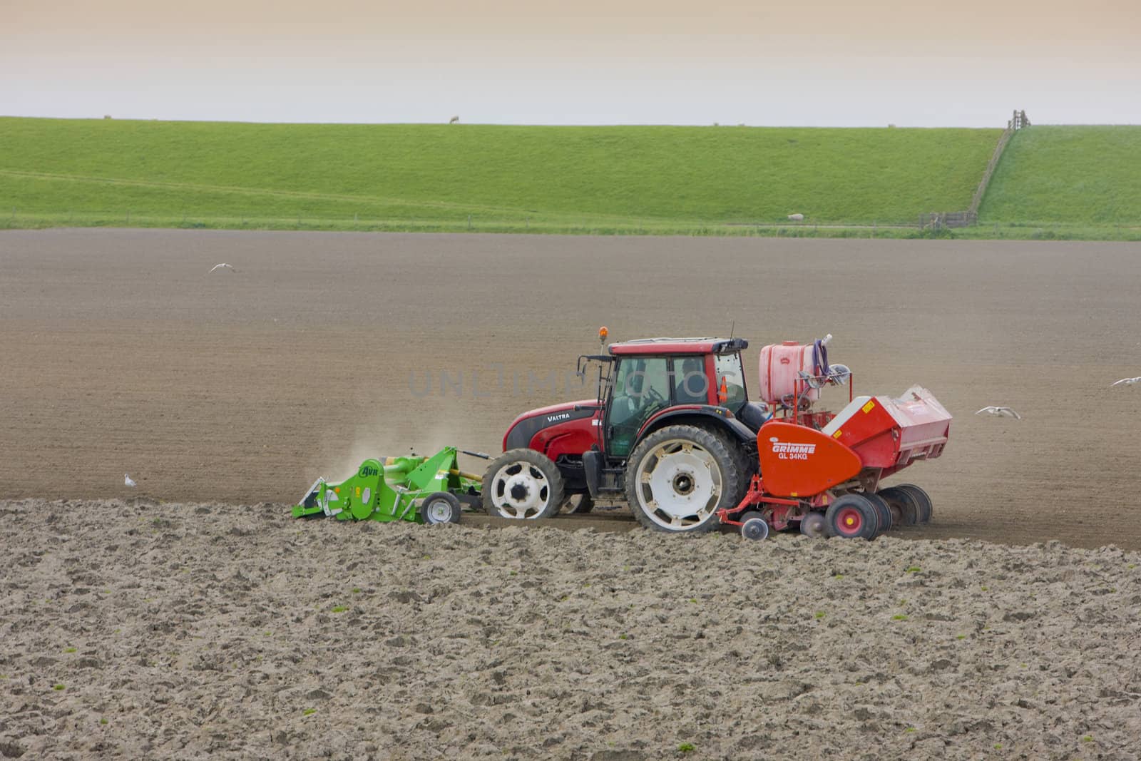 tractor on field, Friesland, Netherlands by phbcz