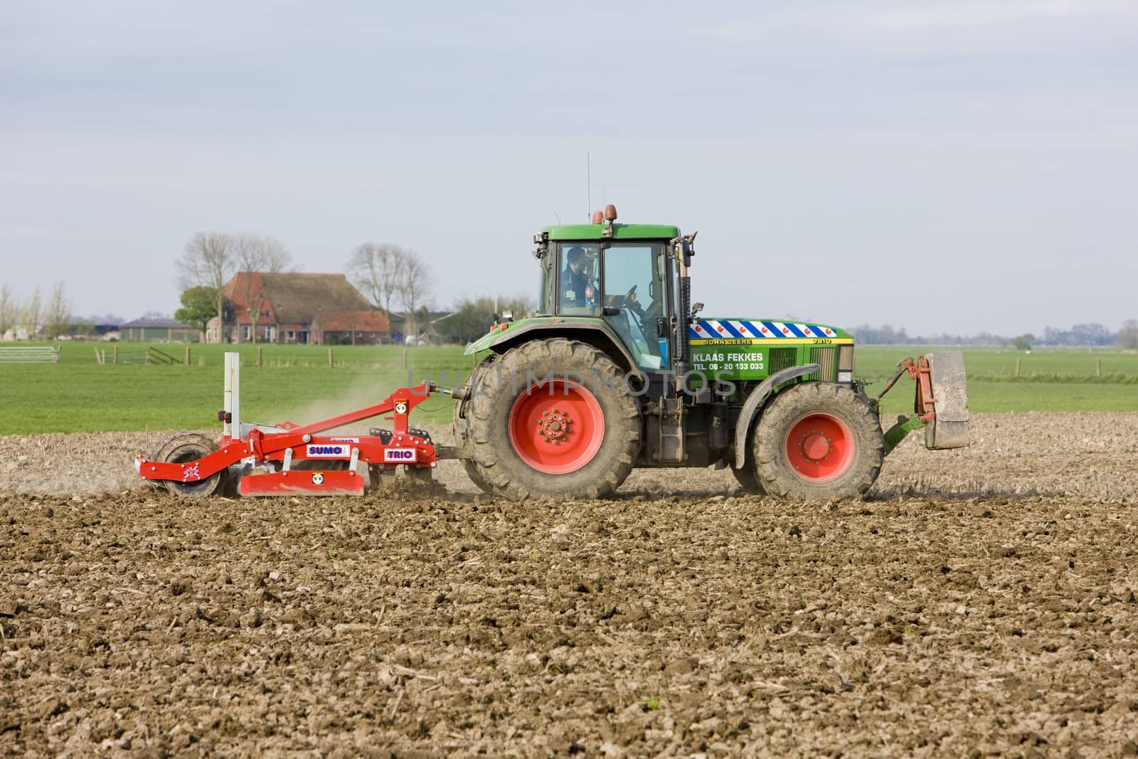 tractor on field, Friesland, Netherlands by phbcz