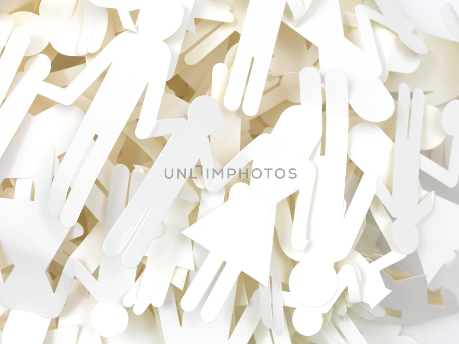 An image of craft people cutouts piled up together
