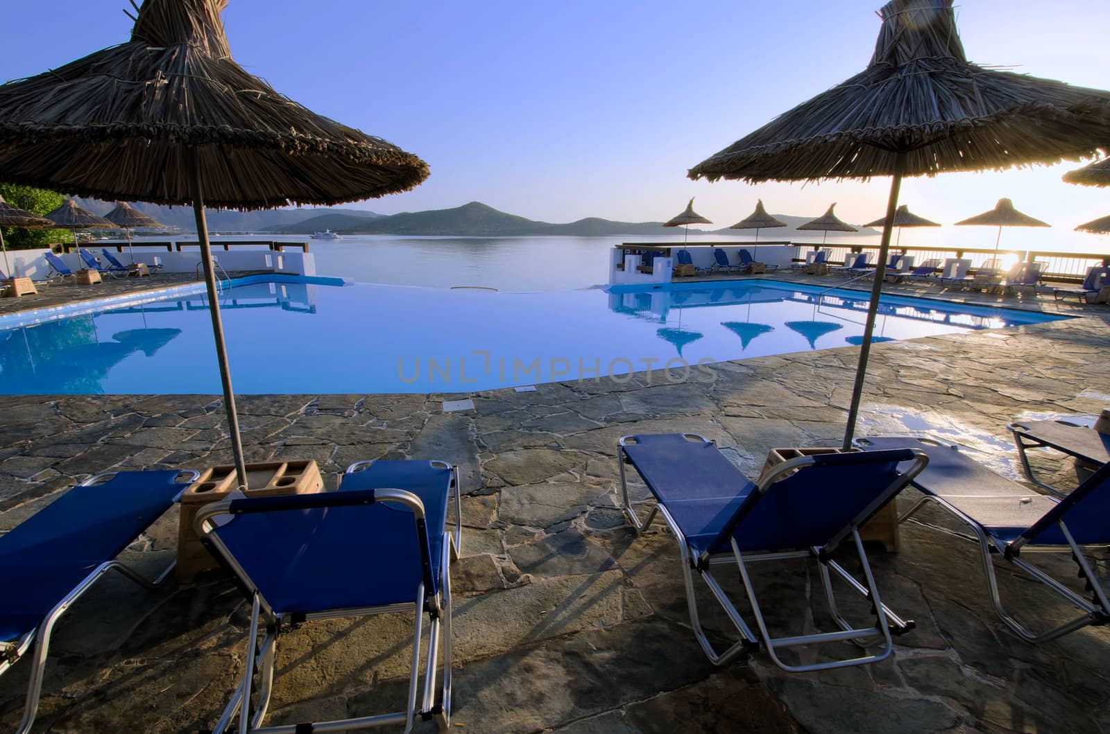 parasols  and lounge chairs at the pool