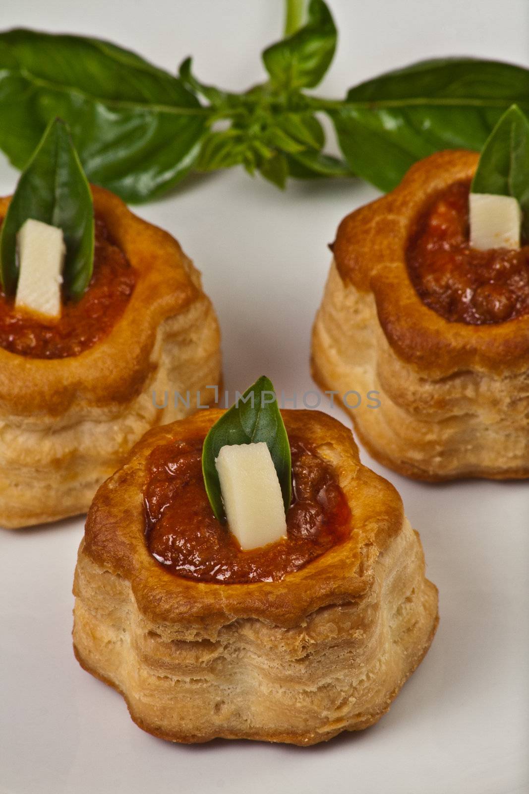 vol au vent with meat souce and basil