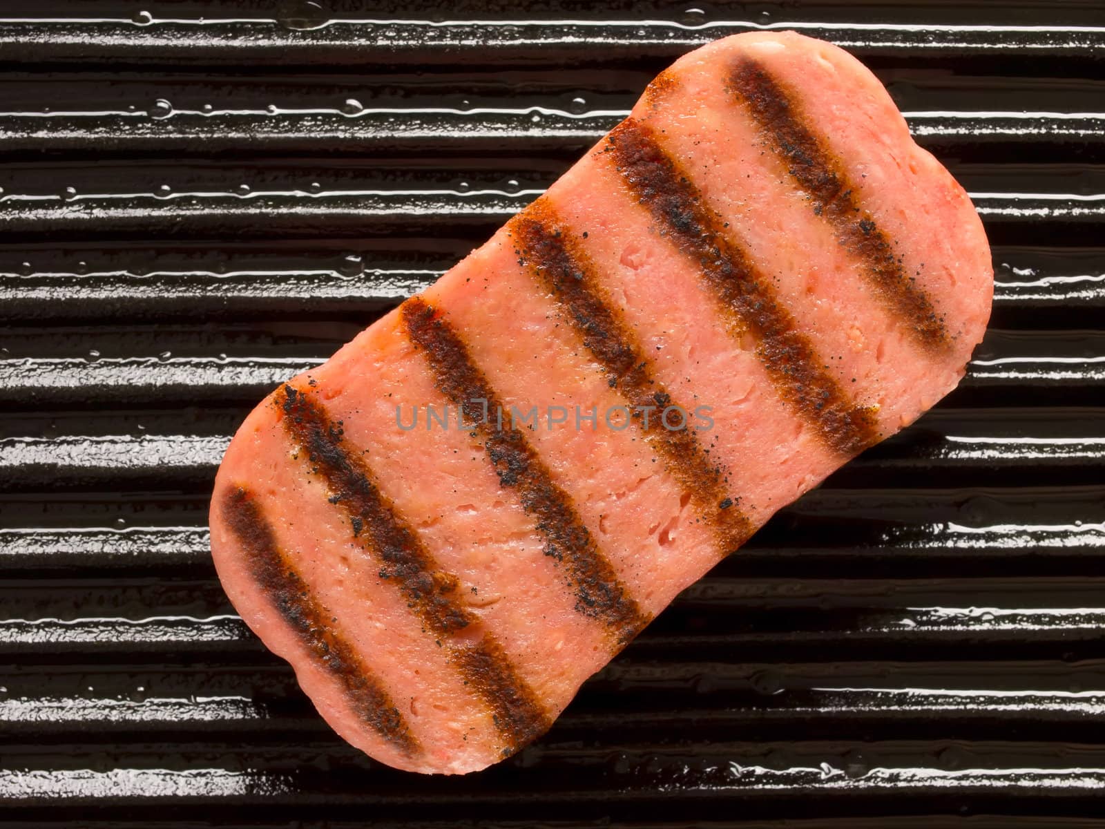 close up o spam on a grill