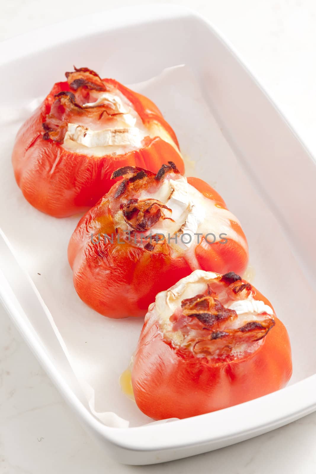 baked tomatoes with goat cheese and pancetta