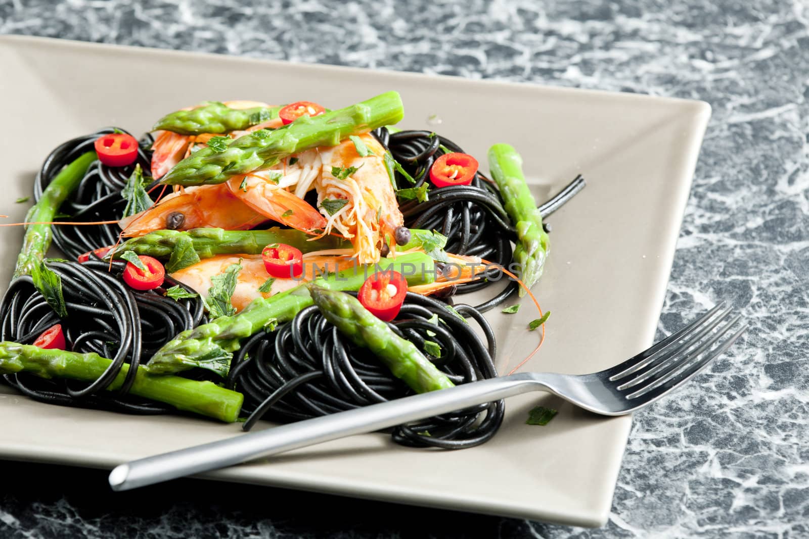 sepia spaghetti with prawns, asparagus and chilli