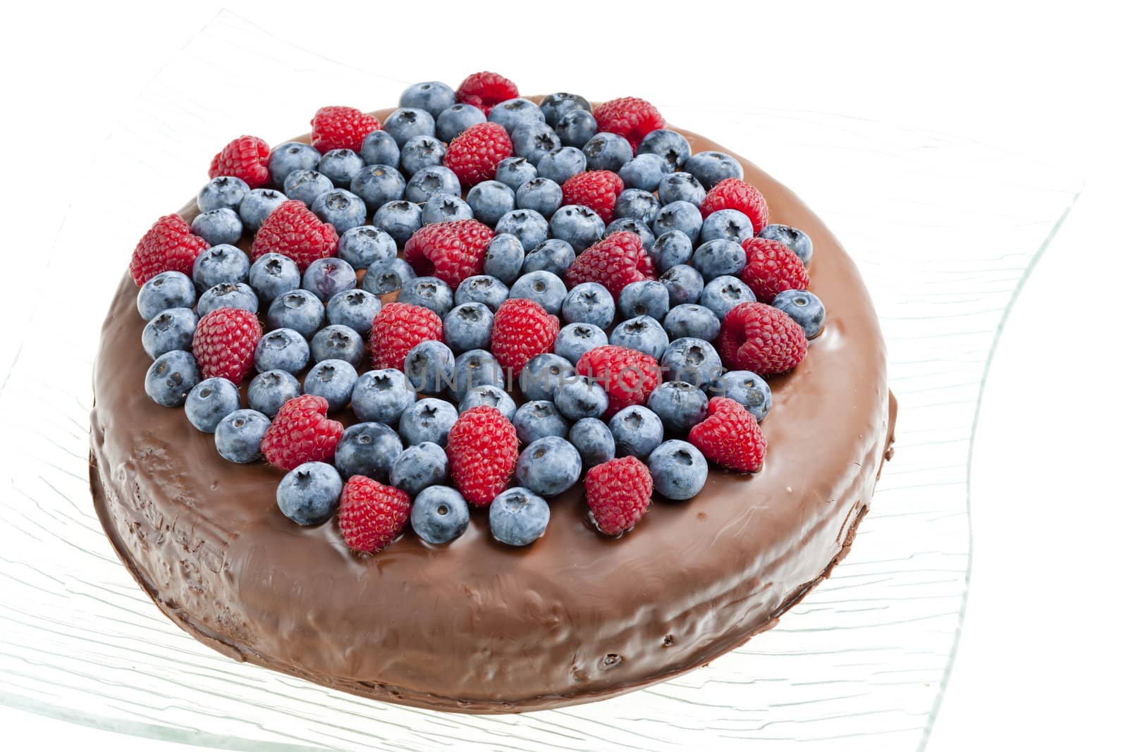 chocolate cake with raspberries and blueberries by phbcz