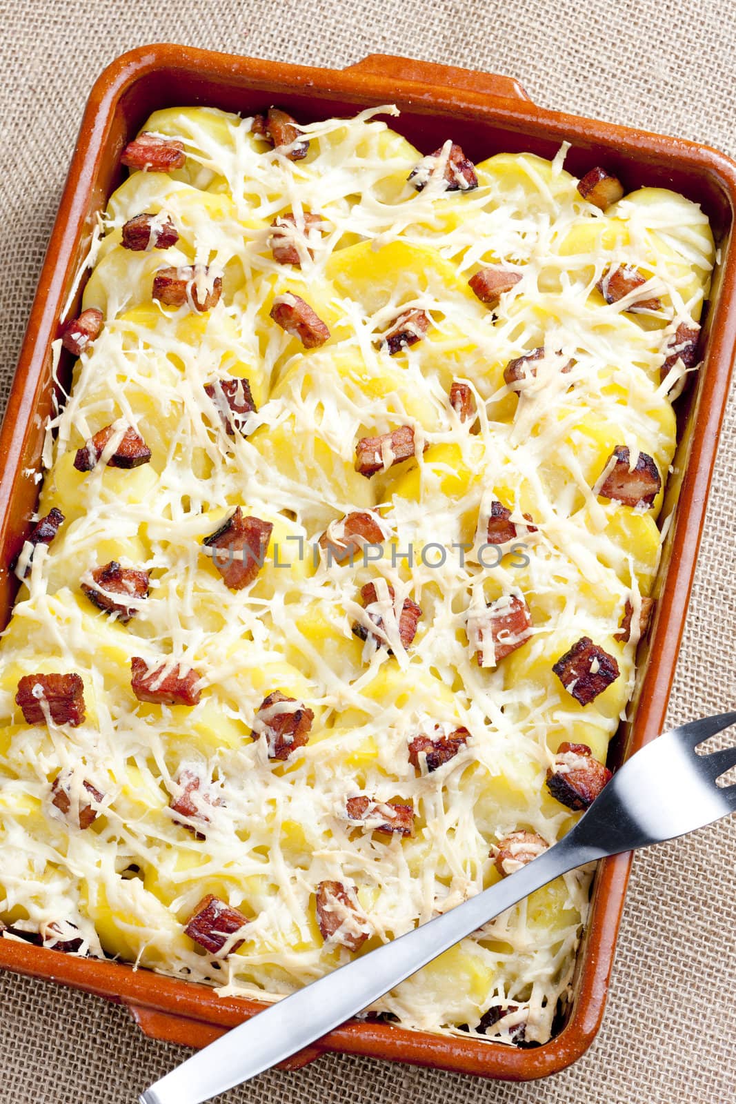 potatoes and bacon baked with pecorino cheese by phbcz