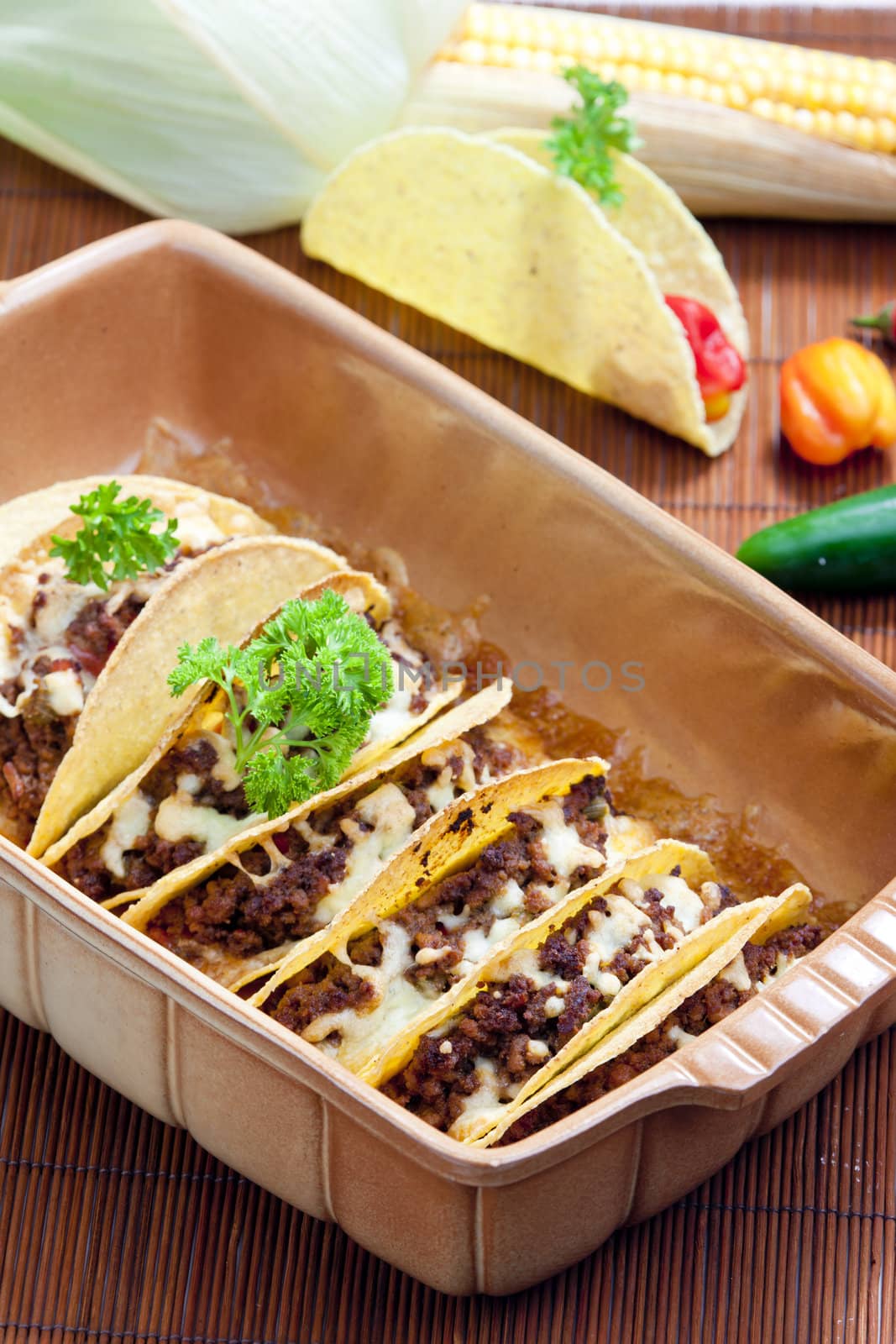 baked tacos with minced meat and cheese by phbcz