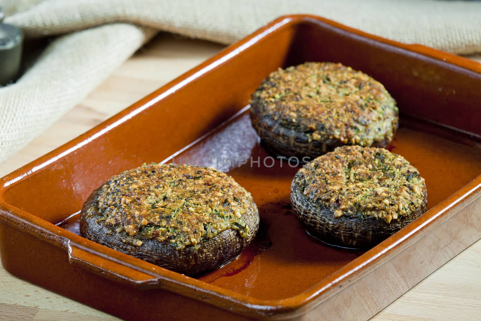 baked champignons filled with peanuts mixture