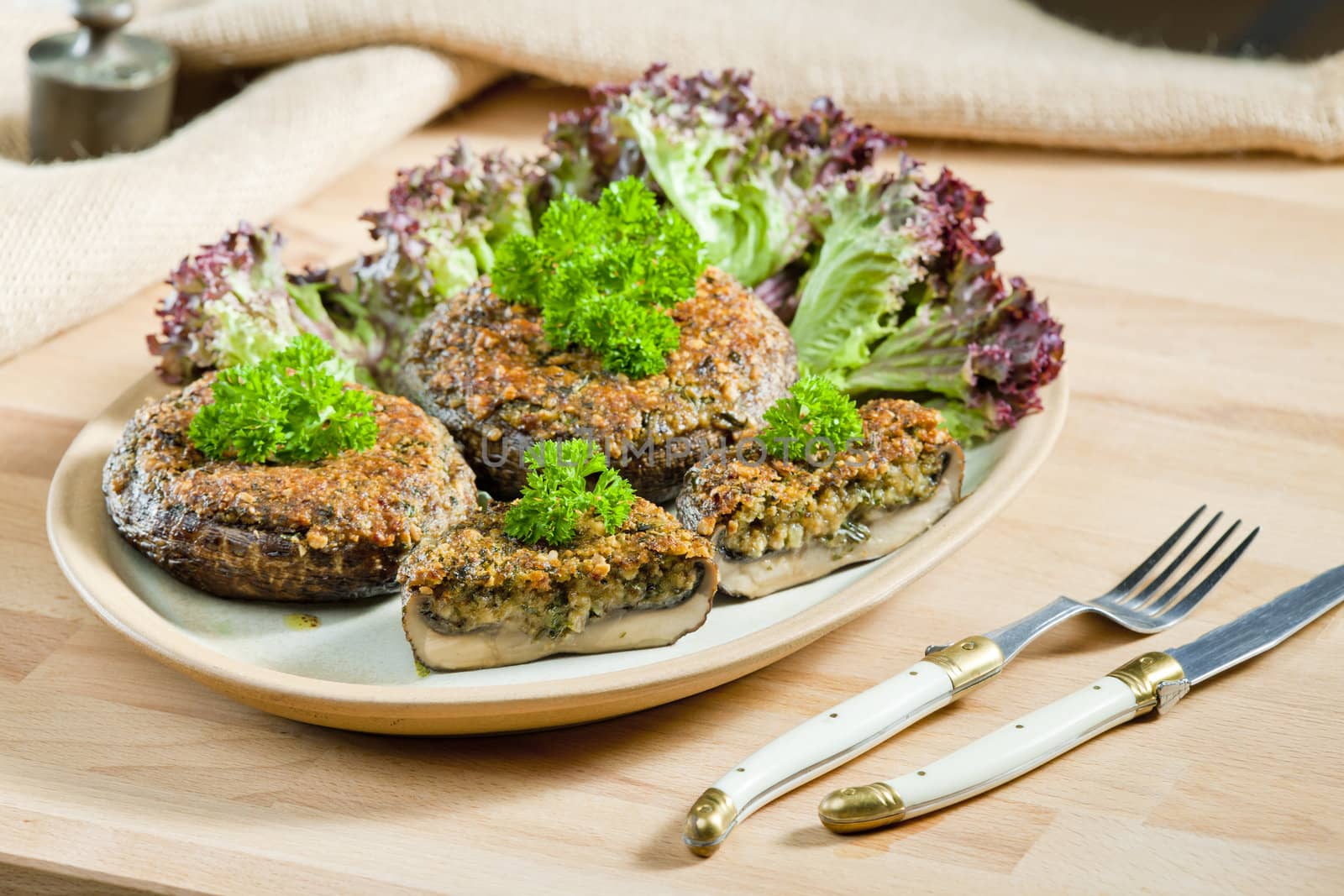 baked champignons filled with peanuts mixture