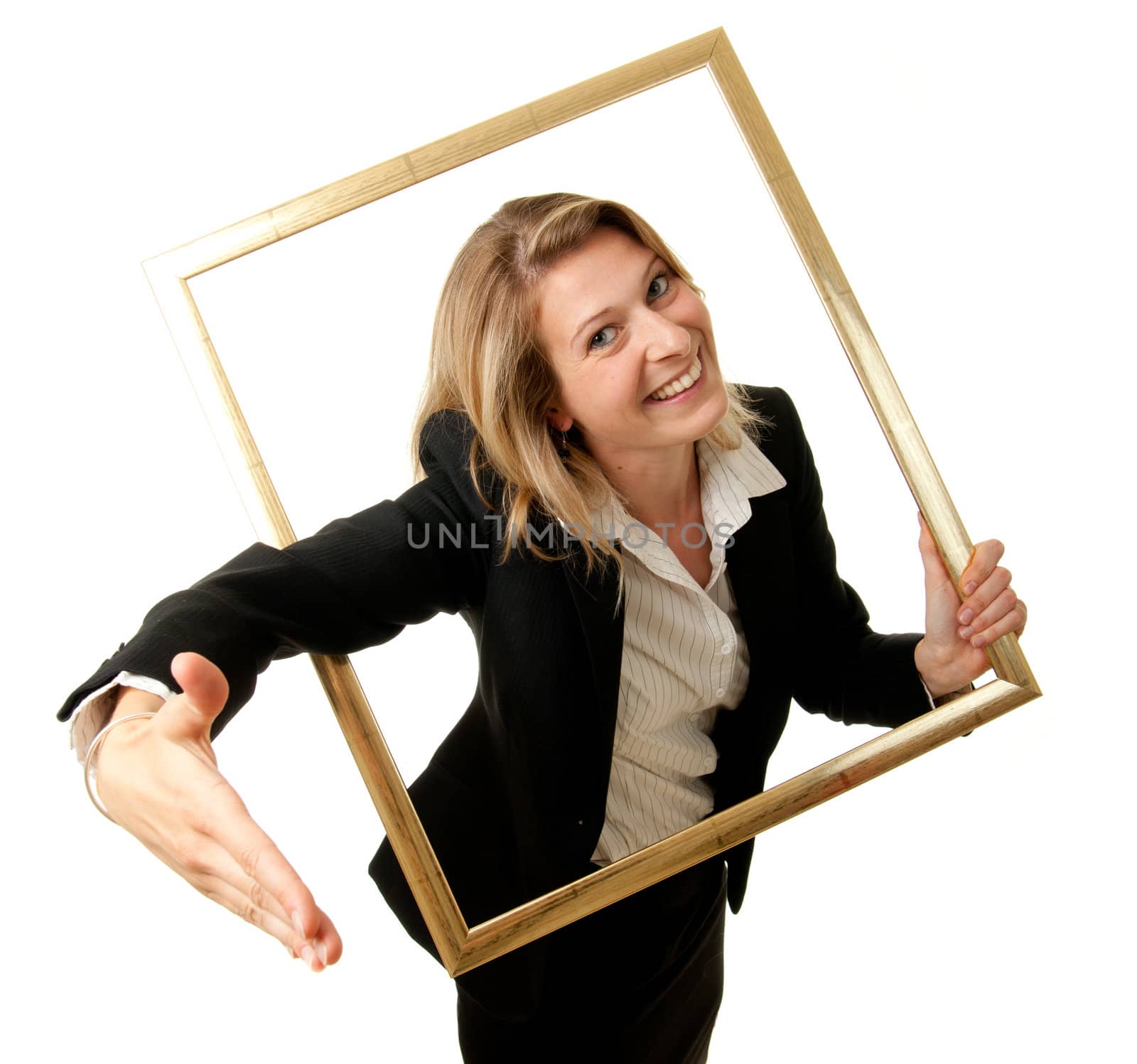 a young businesswoman offering her hand to conclude a contract through a pictureframe