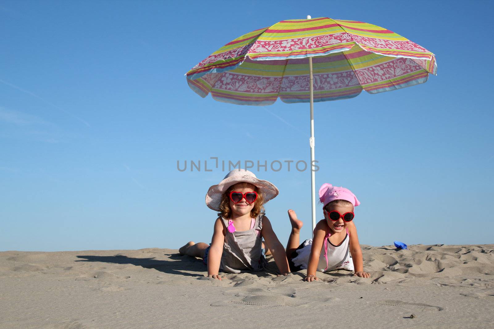two little girl on the beach