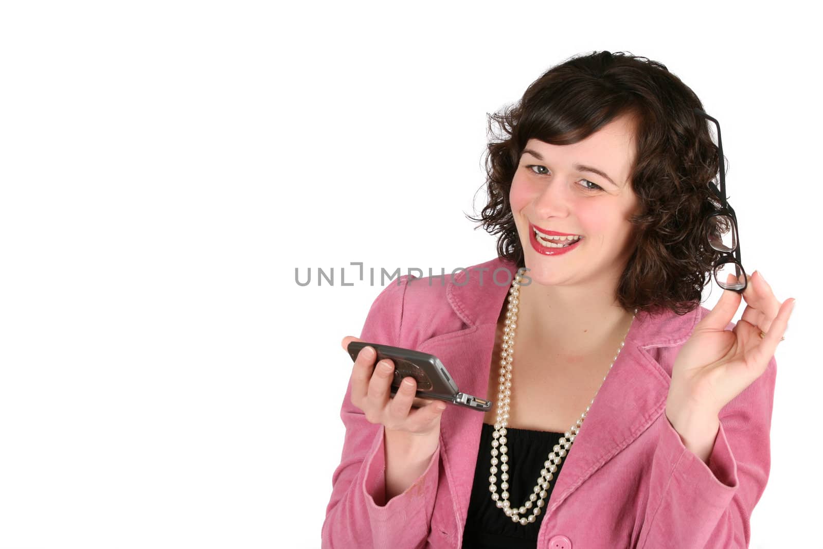 Friendly business woman holding her phone and spectacles