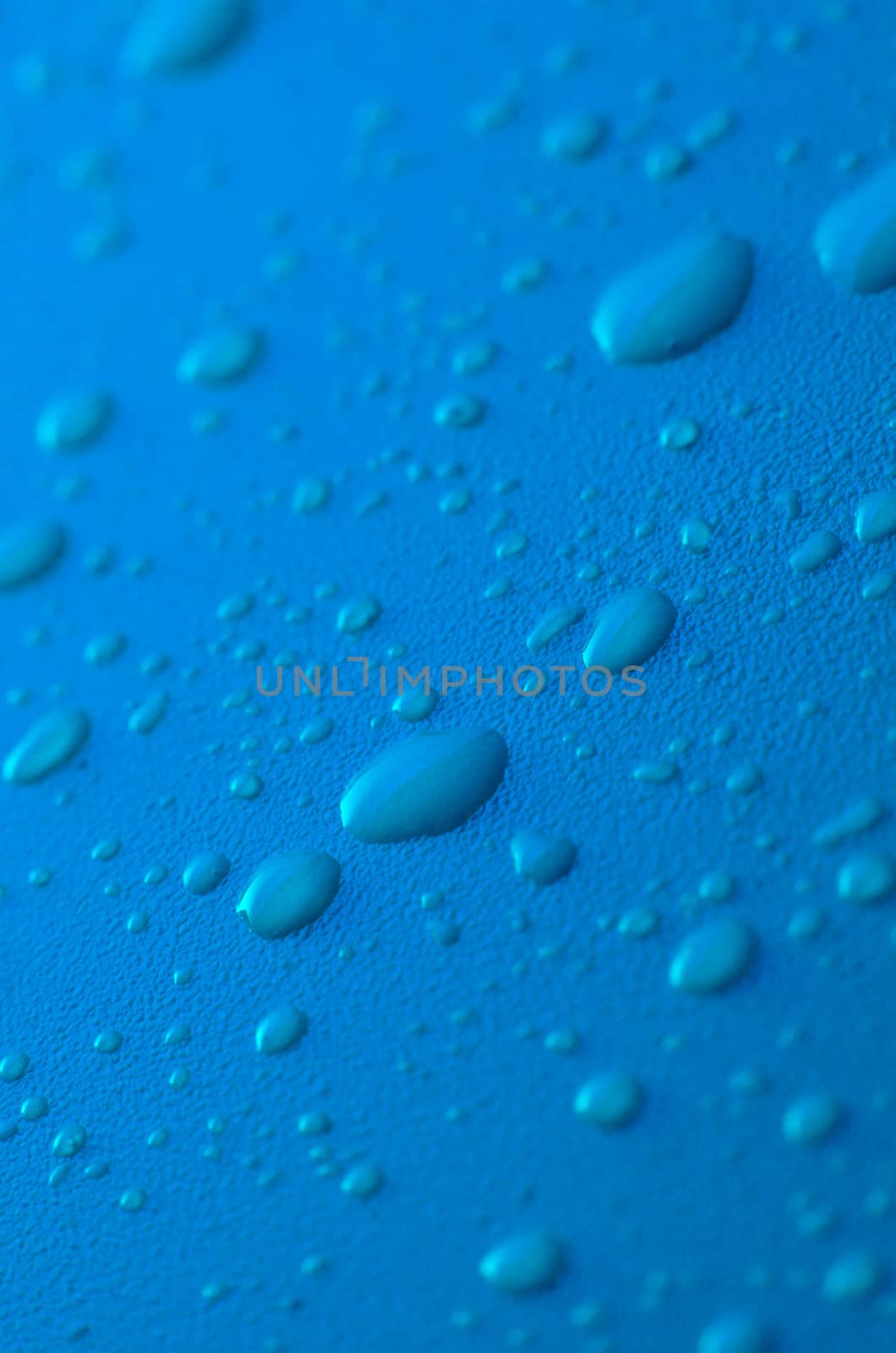 Water drops on blue background.