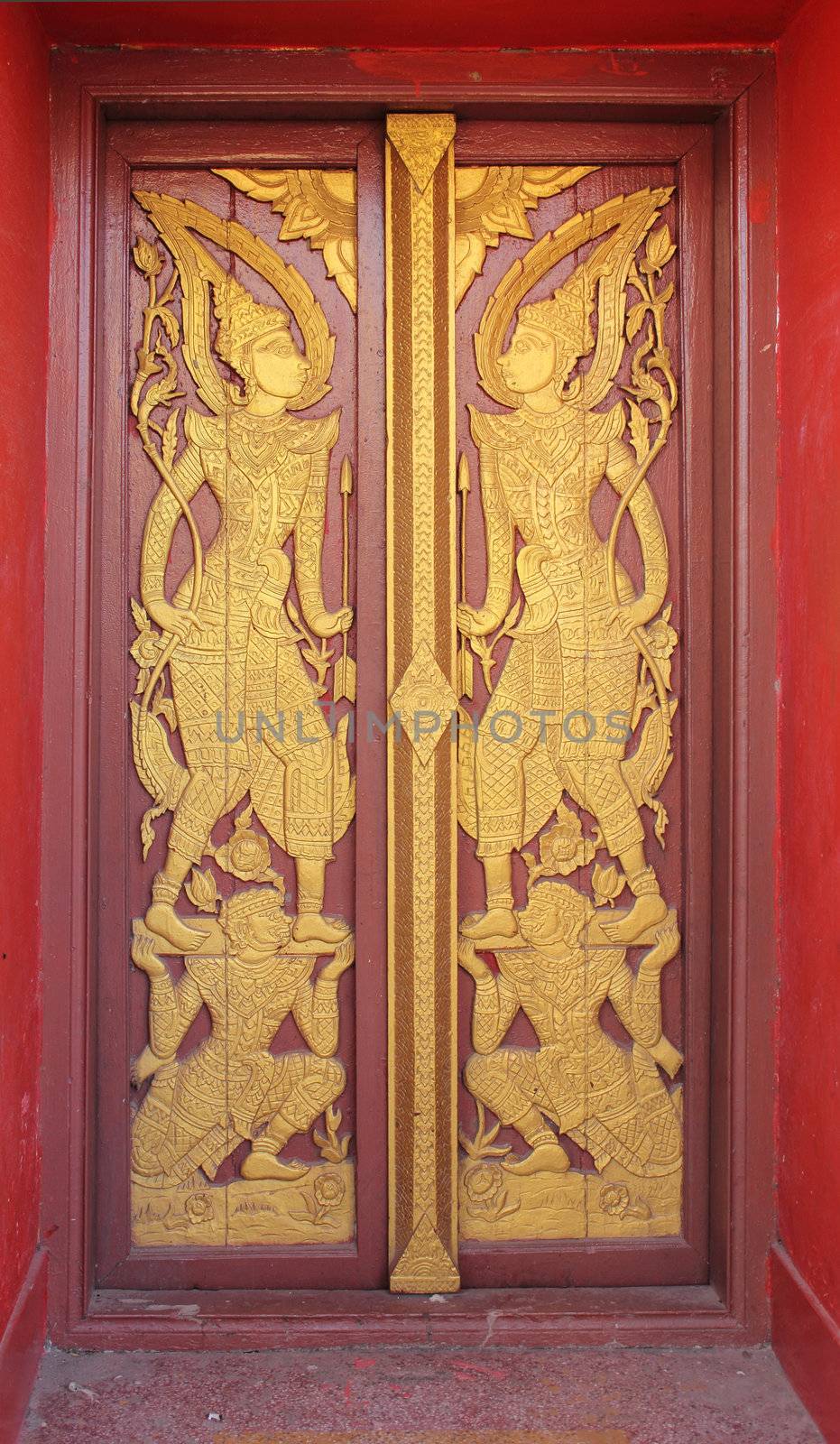Buddhist temple door decoration in the capital of Vientiane, Laos