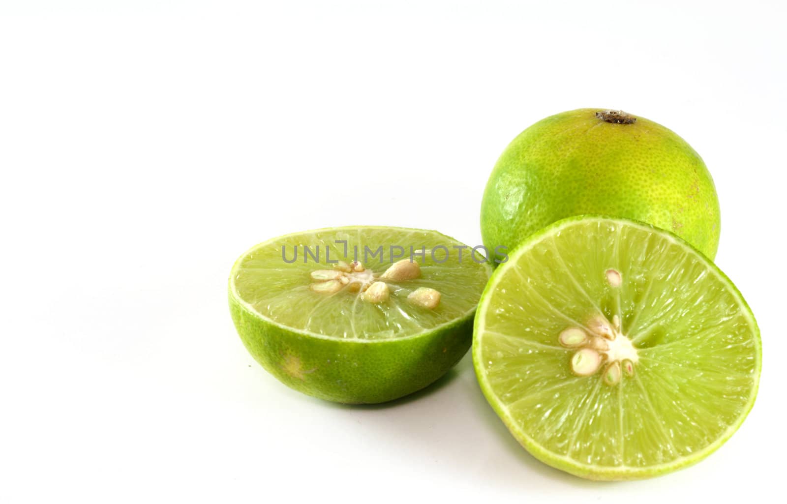 Fresh ripe lime. Isolated on white background