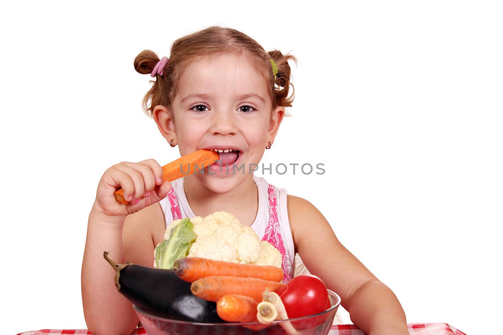 little girl eat carrot