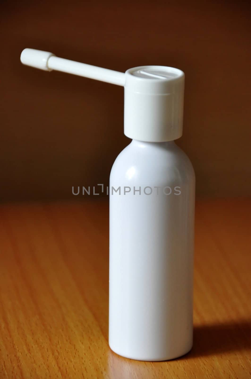 Aerosol in a white bottle for treatment of diseases of a throat